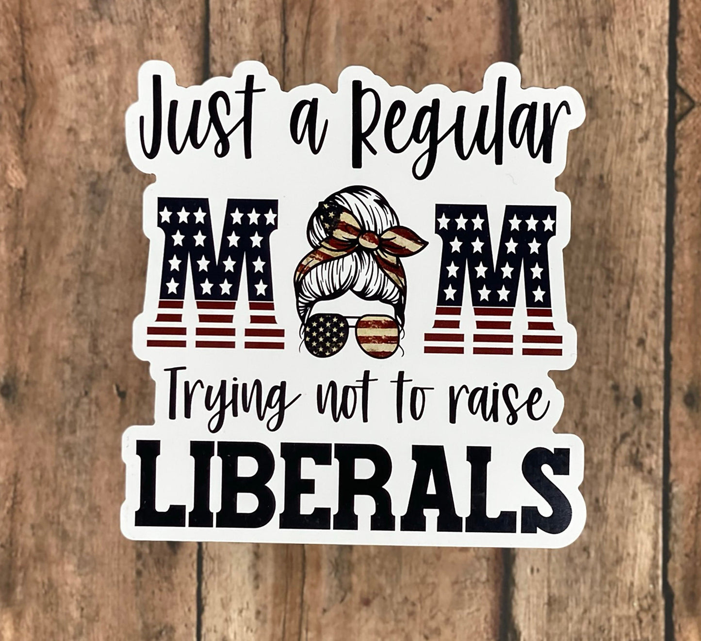 Just a Regular Mom Trying Not to Raise Liberals - Sticker - Decal - Clear Cast Decal for Tumblers, Windows, Laptops etc.